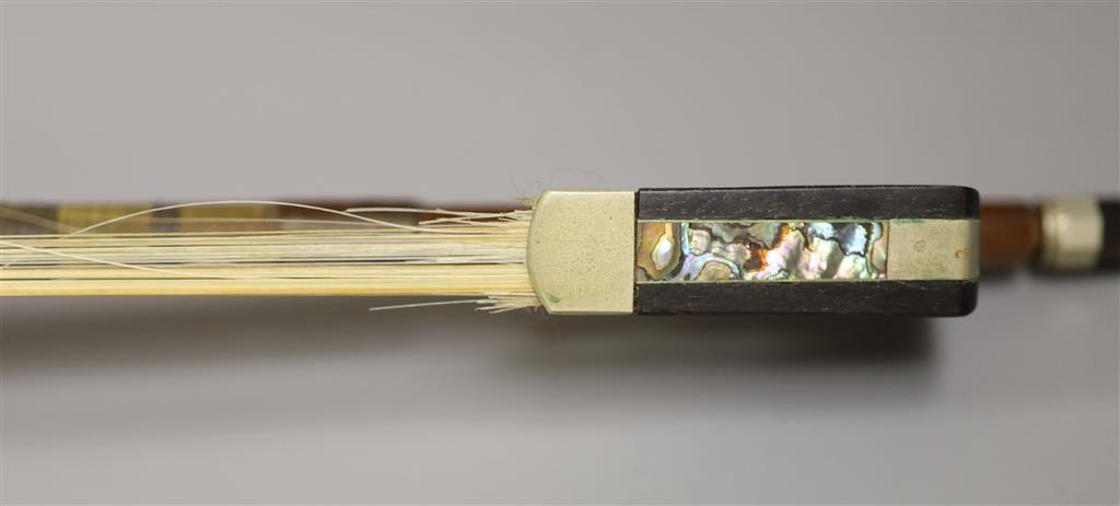 A late 19th century violin and a bow, cased